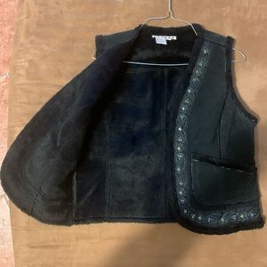 A M I medium size dark blue vest